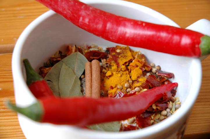 A mix of chilies and spices for a dish of lamb curry.  See the recipe on this site by clicking here.