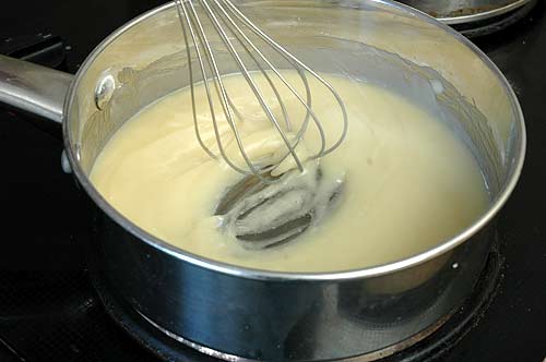 Whisking the flour and oil together.
