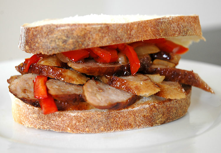 Using the fresh ciabatta bread I had just made Monday night, my Tuesday lunch would be a pan-fried local hot Italian sausage with sauteed onions and peppers.   Kuinshoeve hot Italian sausage is actually pretty spicy stuff but in a very good way.  Wonderful stuff.  That ciabatta is going to become a regular in my house.